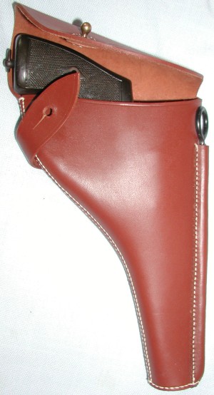 PC&L Webley holster, open, showing fit of pistol